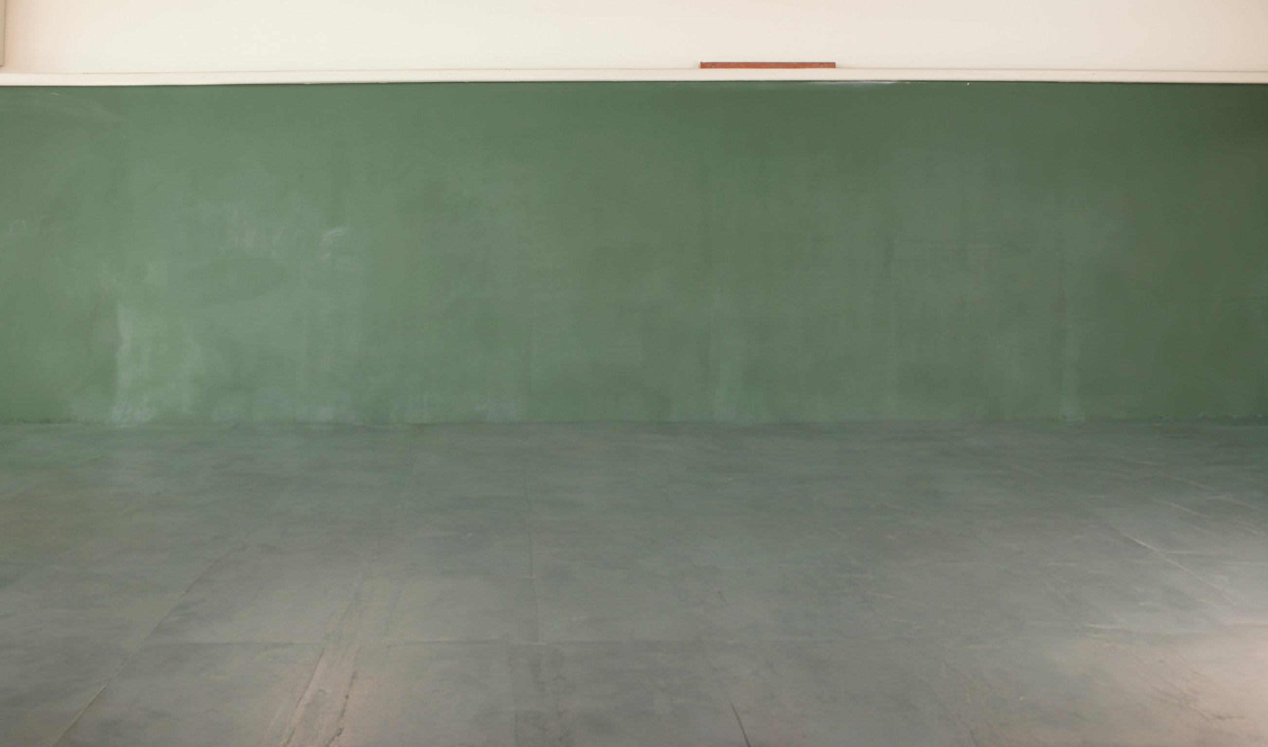 Group of diverse young students standing together in classroom